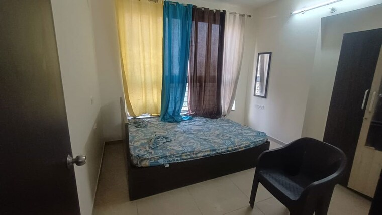 Bedroom, amanora-future-towers 1.5 Bedroom 750 Sq.Ft. Apartment In Hadapsar Pune 10353832