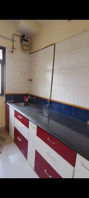 Kitchen in 2 BHK Apartment at Puranik City, Kasarvadavali – for Rent