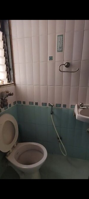 Bathroom in 2 BHK Apartment at Puranik City, Kasarvadavali – for Rent
