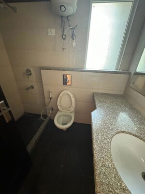 Bathroom in 2 BHK Apartment at Great Value Sharanam, Sector 107 – for Rent