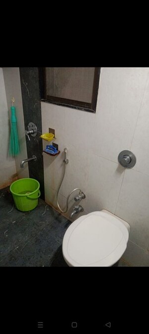 Bathroom in 2 BHK Apartment at Shree Satya Shankar Residency, Manpada – for Rent