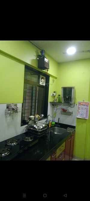 Kitchen in 2 BHK Apartment at Shree Satya Shankar Residency, Manpada – for Rent