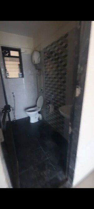 Bathroom in 1 BHK Apartment at Gala Lifestyle Pride Residency, Kasarvadavali – for Rent