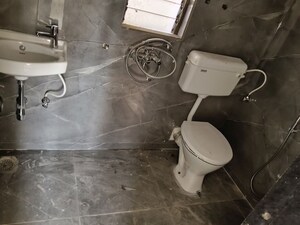 Bathroom in 1 BHK Apartment at Vasudev Sky High, Mira Road – for Rent