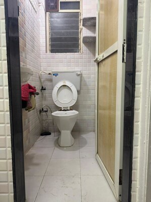 Bathroom in 2 BHK Apartment at Shatdal CHS LTD, Andheri West – for Rent