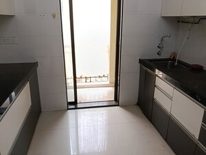 Kitchen in 1 BHK Apartment at Unique Garden, Mira Road East – for Rent