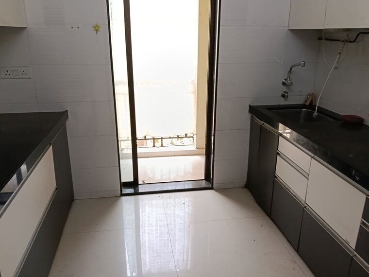 Kitchen, unique-garden 1 Bedroom 695 Sq.Ft. Apartment In Mira Road East Thane 10353974