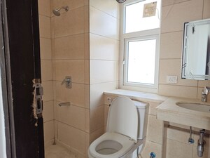 Bathroom in 3 BHK Apartment at Puri Diplomatic Greens Phase I, Sector 111 – for Rent