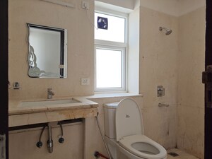 Bathroom in 3 BHK Apartment at Puri Diplomatic Greens Phase I, Sector 111 – for Rent