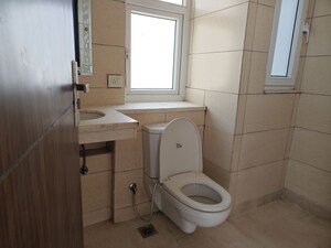 Bathroom in 3 BHK Apartment at Puri Diplomatic Greens Phase I, Sector 111 – for Rent