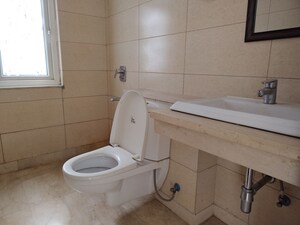 Bathroom in 4 BHK Apartment at Puri Diplomatic Greens Phase I, Sector 111 – for Rent