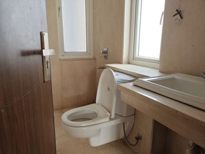 Bathroom in 4 BHK Apartment at Puri Diplomatic Greens Phase I, Sector 111 – for Rent