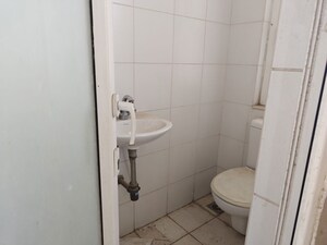 Bathroom in 4 BHK Apartment at Puri Diplomatic Greens Phase I, Sector 111 – for Rent
