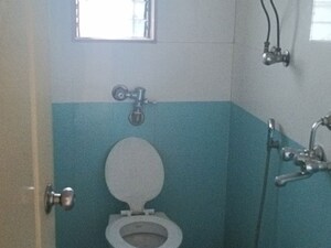 Bathroom in 1 BHK Apartment at Swastik Palms CHS, Brahmand – for Rent