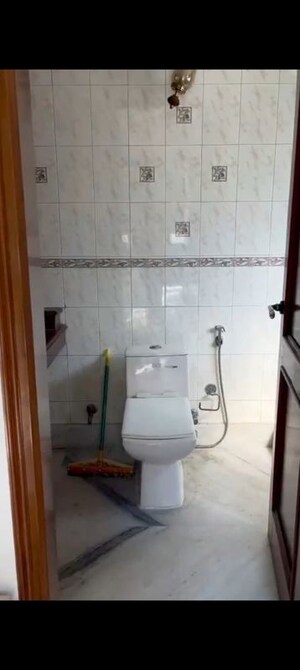 Bathroom in 2 BHK Apartment at Chittaranjan Park – for Rent