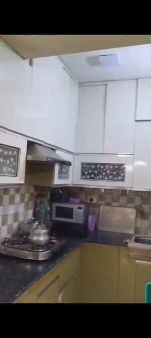 Kitchen in 2 BHK Apartment at Ajnara Integrity, Raj Nagar Extension – for Sale