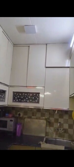 Kitchen in 2 BHK Apartment at Ajnara Integrity, Raj Nagar Extension – for Sale