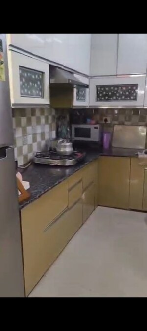 Kitchen in 2 BHK Apartment at Ajnara Integrity, Raj Nagar Extension – for Sale
