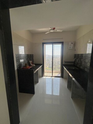 Kitchen in 1 BHK Apartment at Regency Sarvam Phase III, Titwala – for Sale