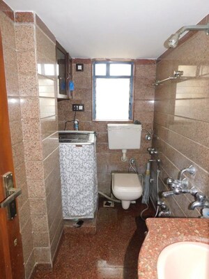 Bathroom in 2 BHK Apartment at Juhu – for Rent