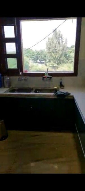 Kitchen in 3 BHK Builder Floor at Sector 27 – for Sale