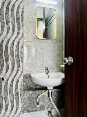 Bathroom in 1 BHK Apartment at Man Opus, Mira Road – for Sale