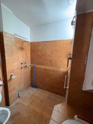 Washroom in 3 BHK Builder Floor at Kalkaji – for Rent
