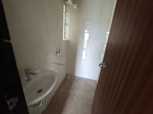 Bathroom in 1 BHK Apartment at ACE Homes, Kasarvadavali – for Rent