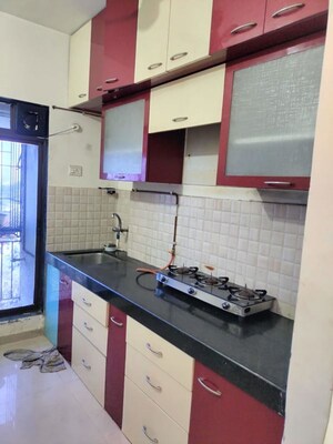 Kitchen in 1 BHK Apartment at Puranik Aarambh, Ghodbunder Road – for Rent