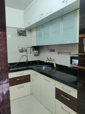 Kitchen in 3 BHK Apartment at Adi Skyline Apartments, Wakad – for Rent