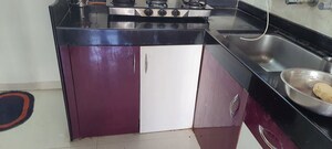 Kitchen in 2 BHK Apartment at GK Dwarka Flora Residency, Pimple Saudagar – for Rent