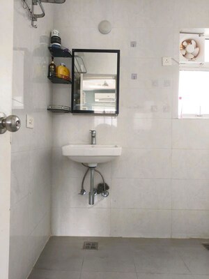 Bathroom in 3 BHK Apartment at Omaxe The Forest, Sector 92 – for Rent