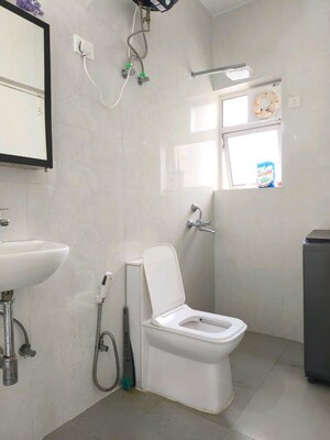 Bathroom in 3 BHK Apartment at Omaxe The Forest, Sector 92 – for Rent