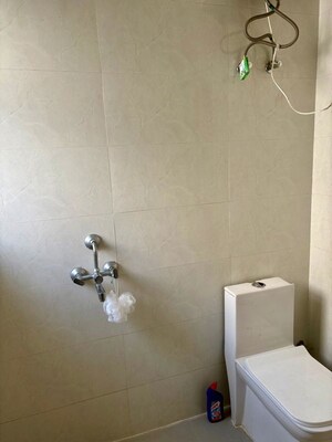 Bathroom in 3 BHK Apartment at Omaxe The Forest, Sector 92 – for Rent