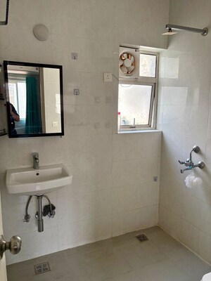 Bathroom in 3 BHK Apartment at Omaxe The Forest, Sector 92 – for Rent
