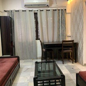 Living Room in 1 BHK Apartment at Yesh Krupa CHS, Shimpoli – for Rent