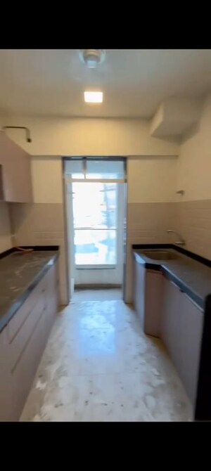 Kitchen in 3 BHK Apartment at JP North Euphoria, Mira Road – for Rent