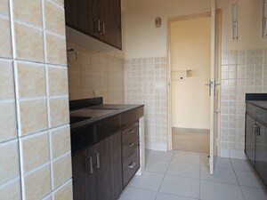 Kitchen in 2 BHK Apartment at Mahindra Aura, Sector 110a – for Rent