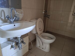 Bathroom in 2 BHK Apartment at Mahindra Aura, Sector 110a – for Rent