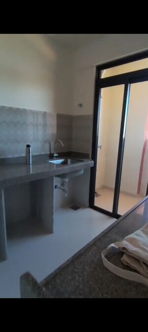 Kitchen in 1 BHK Apartment at Lodha Amara, Kolshet Road – for Rent