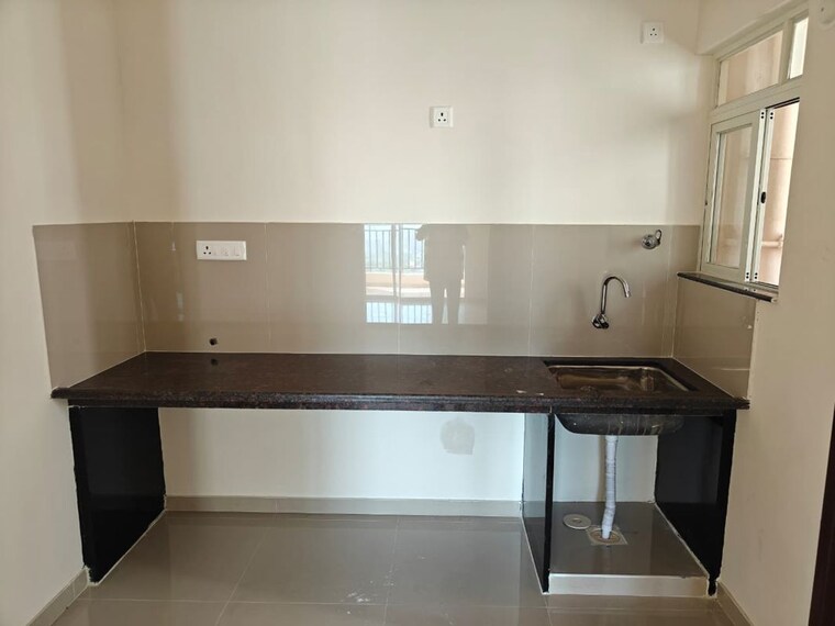 Kitchen, puraniks-abitante-fiore 2 Bedroom 950 Sq.Ft. Apartment In Bavdhan Pune 10354771