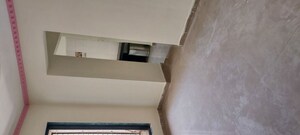 Living Room in 1 BHK Apartment at Rukmini Garden, Titwala – for Sale