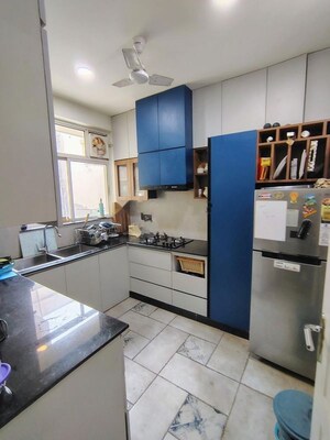 Kitchen in 3 BHK Apartment at Ansal API Esencia, Sector 67 – for Rent
