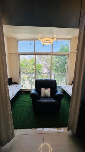 Living Room in 2 BHK Apartment at Welwoath Tinseltown, Bavdhan – for Rent