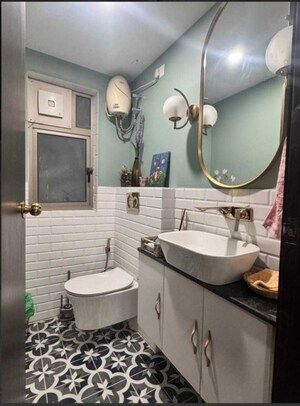 Bathroom in 3 BHK Apartment at Tata Raheja Raisina Residency, Sector 59 – for Sale
