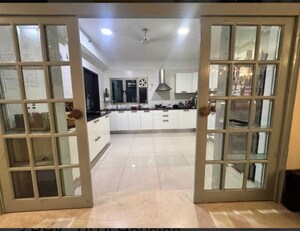 Kitchen in 3 BHK Apartment at Tata Raheja Raisina Residency, Sector 59 – for Sale