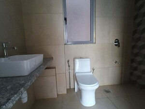 Bathroom in 4 BHK Apartment at Kalpataru Immensa G, Kolshet Road – for Rent