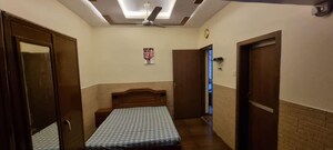 Bedroom in  Pg at Anand Milan Society, Santacruz West – for Rent