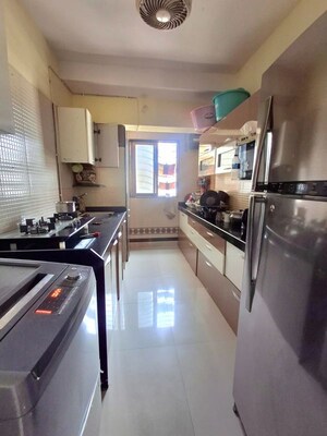 Kitchen in 1 BHK Apartment at Raunak Bliss B1, Ghodbunder Road – for Rent