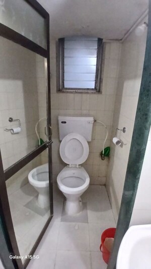 Bathroom in 1 BHK Apartment at JP North Estella, Mira Road – for Rent